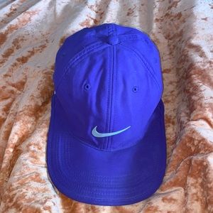 purple Nike golf hat